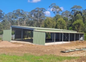 Skillion roof farm shed with pillars. Not fully enclosed